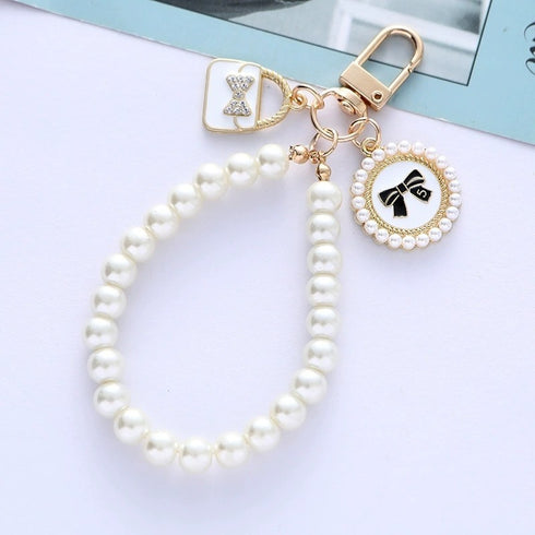 LV PEARL BAG CHARM
