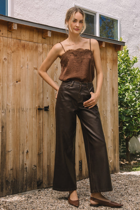 DISTRESSED FAUX LEATHER PANTS